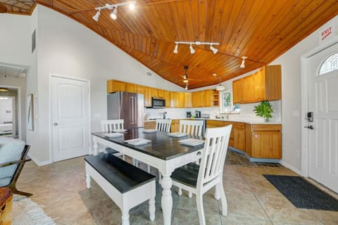 Elevate your culinary experience in this well-appointed kitchen and dining area: where style and functionality seamlessly blend