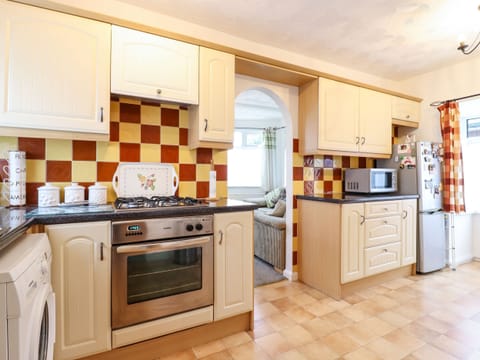 Fridge, electric kettle, toaster, cookware/dishes/utensils