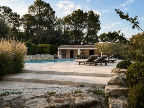 Secluded swimming pool area with fully fitted pool house