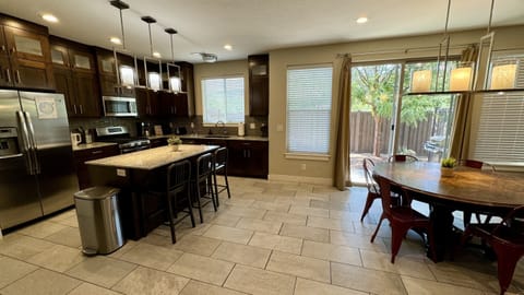 Dining Area with Extra Seating at the Kitchen Island
