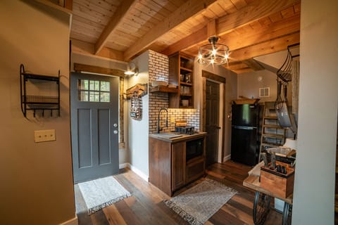 Downstairs entrance to kitchen,dining, and full bathroom.