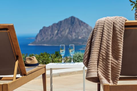 Seasonal outdoor pool, open 9:30 AM to 7:00 PM, pool umbrellas