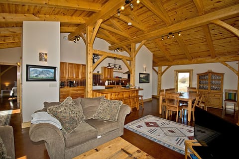 Open Living/Dining and Kitchen Area with Vaulted Ceilings
