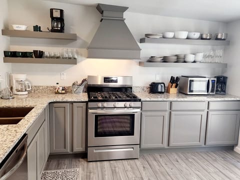 Beautiful, bright open kitchen w/ open shelving