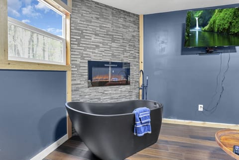 Soaker tub and fireplace