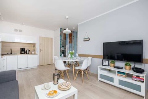 A modern dining and living area, blending functionality with elegant decor.