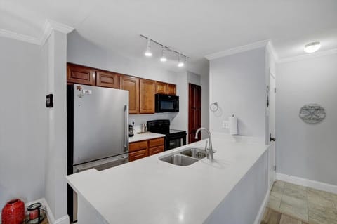 Whether you're whipping up a quick meal or preparing a feast, this fully equipped kitchen has everything you need to make your culinary dreams a reality.