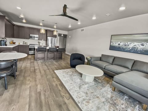 Experience bright, open-concept living in this modern space. Features include a gourmet kitchen with a large island, cozy dining area, and sun-drenched windows—perfect for a stylish group getaway.