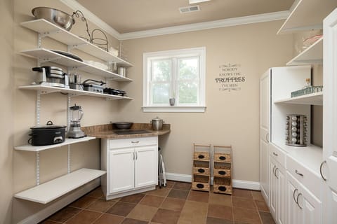 Pantry in a Dedicated Room - Plenty of Room for Groceries and Stores Countertop Appliances 