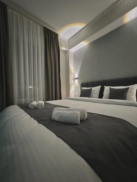 Hypo-allergenic bedding, desk, blackout drapes, soundproofing