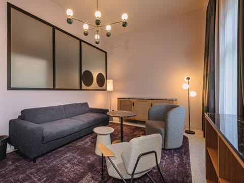 Senior Studio Suite | Living area | 50-inch LCD TV with cable channels