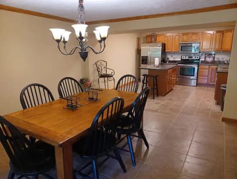 Dining area and kitchen and background