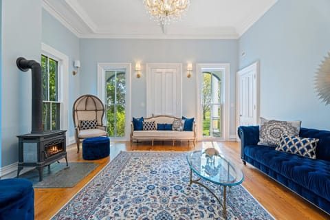 The living room with 20-foot ceilings. This room gets plenty of natural light