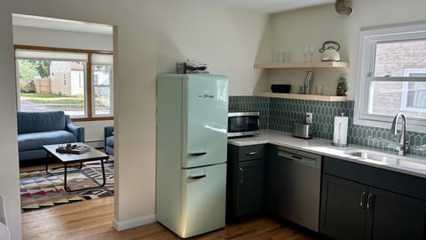 Kitchen looking into living room