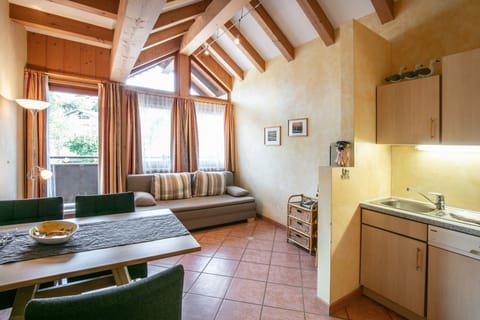 Junior Suite | Living area | 1-inch flat-screen TV with cable channels, TV