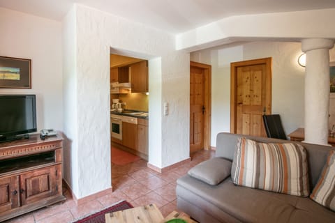 Junior Suite | Living area | 1-inch flat-screen TV with cable channels, TV