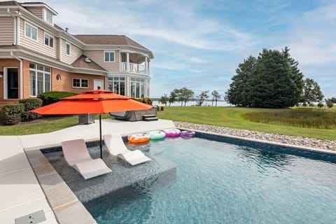 Spacious home with expansive backyard and pool for ultimate relaxation.