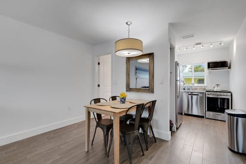 Dining  Enjoy a nice home cooked meal or some takeout with your family on the table fit for 4