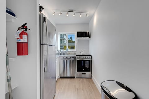 Kitchen Full sized refrigerator! Don't worry about buying too much. You have room for it!