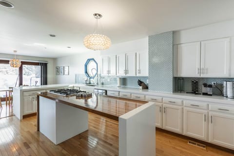 Large kitchen with gas range and all the usual appliances