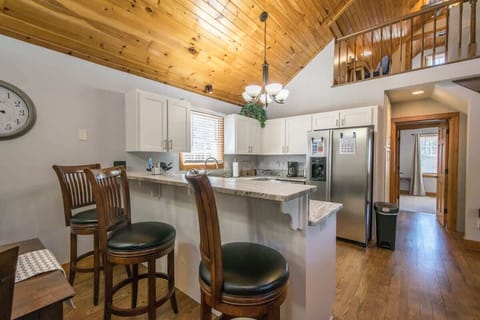 Pull up a seat and chat while preparing your favorite food in the kitchen.