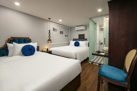 Basic Triple Room | Premium bedding, memory foam beds, minibar, soundproofing