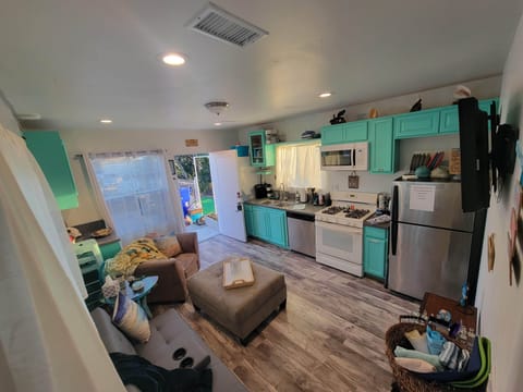 Great room Kitchen and living room area. There is a floating Table/island also:)