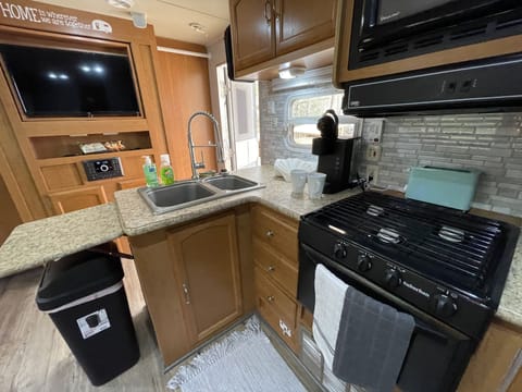 Every kitchen convenience, all inside one camper!