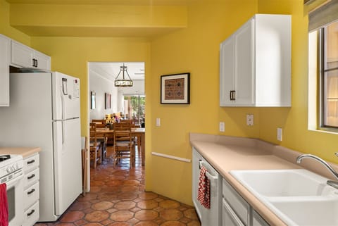 The kitchen is clean and well-equipped