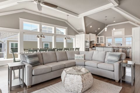 Cozy up with a view—this bright and breezy living room lets you soak in the Atlantic from sunrise to sunset. (*Please Note: The fireplace is not for guest use)