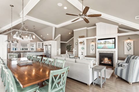 Breezy, beachy, and beautifully open—this top level invites you to relax, connect, and unwind together. (*Please Note: The fireplace is not for guest use)