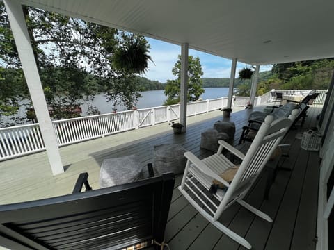 Huge front porch with ample seating to take in the beautiful scenery of the Lake
