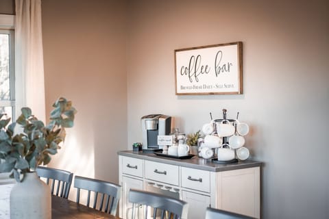 Fully stocked coffee bar with multiple kinds of drip and keurig coffees provided