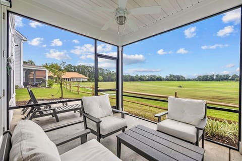 Lots of seating and beautiful views of the driving range from two private patios