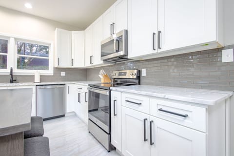 Renovated kitchen with new cabinets and appliances