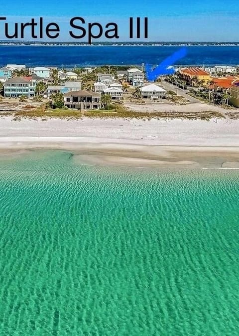 Drone footage looking at our Turtle Spa House from the Gulf.