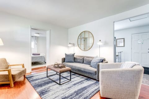 Spacious, airy living-room. The couch folds out into a full size futon.