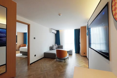 Standard Suite, 1 Bedroom | Living area | 52-inch Smart TV with cable channels