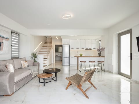 The living room sofa bed, unfolds & can welcome two more guests.