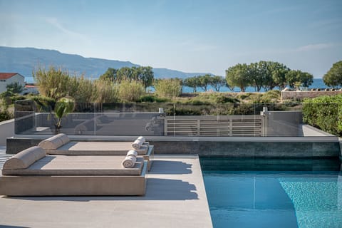 Premium Sun-beds await summer gatherings.