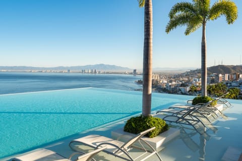 2 outdoor pools, pool umbrellas, sun loungers