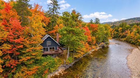 Experience the ultimate New England fall retreat right along the crystal-clear river.