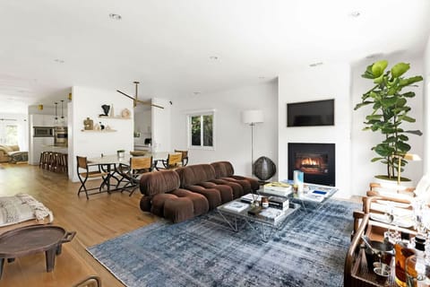 Living Room with Fireplace and Dining Area