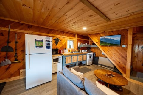This kitchen has everything you need — modern appliances, rustic charm, and all the essentials for a comfortable stay.