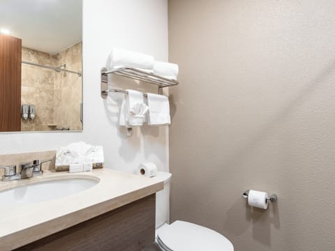 Shower, rainfall showerhead, hair dryer, towels