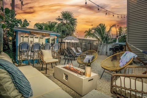 The sunsets here are like none other. Relax by the firepit under the twinkling string lights, grill up some dinner, take an afternoon pool dip, or hangout in the tiki bar!