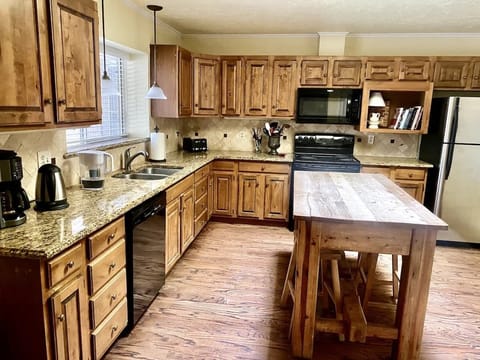 LARGE open kitchen and fully stocked to make your favorite home cooked meals