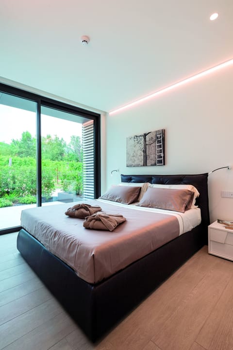 Luxury Condo | Premium bedding, down comforters, minibar, in-room safe