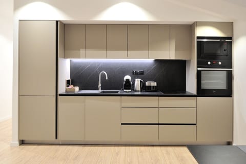 Exclusive Apartment, 2 Twin Beds, Non Smoking, Courtyard Area | Private kitchen | Full-size fridge, microwave, oven, stovetop