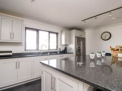 Fridge, electric kettle, toaster, cookware/dishes/utensils